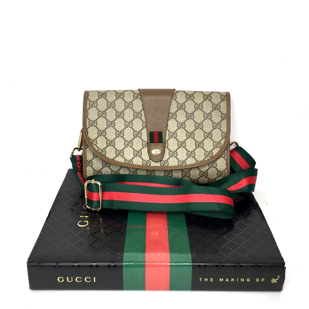Authentic Gucci brown monogram coated canvas crossbody bag/ clutch.